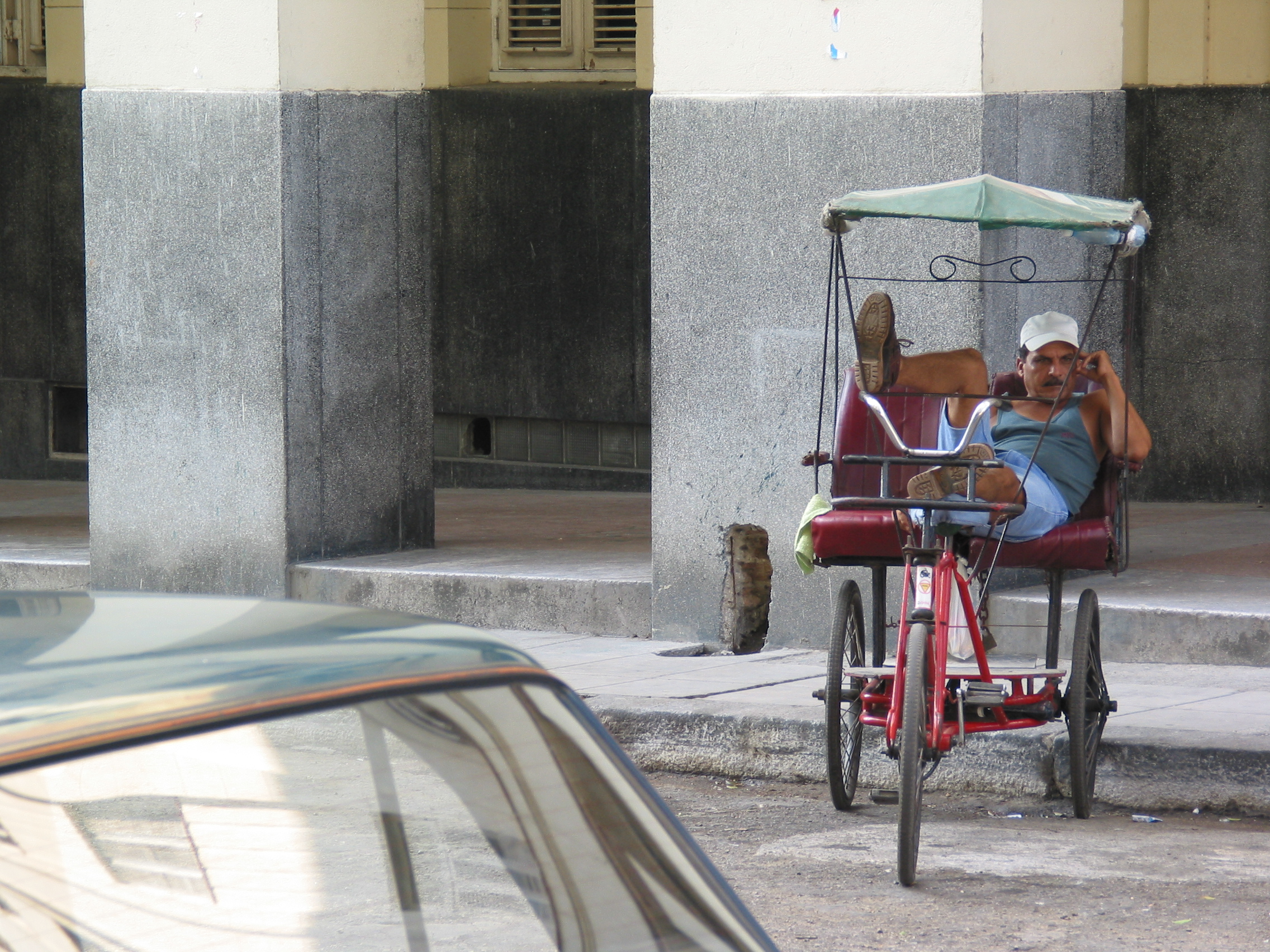 Taxi Driver resting, Havana, Cuba.